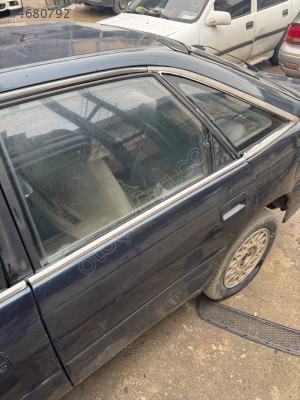 Mazda 626 sol arka kapı orijinal